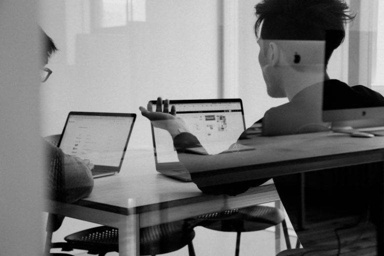 Employee - man using MacBook