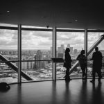 Leadership Business - people standing inside city building