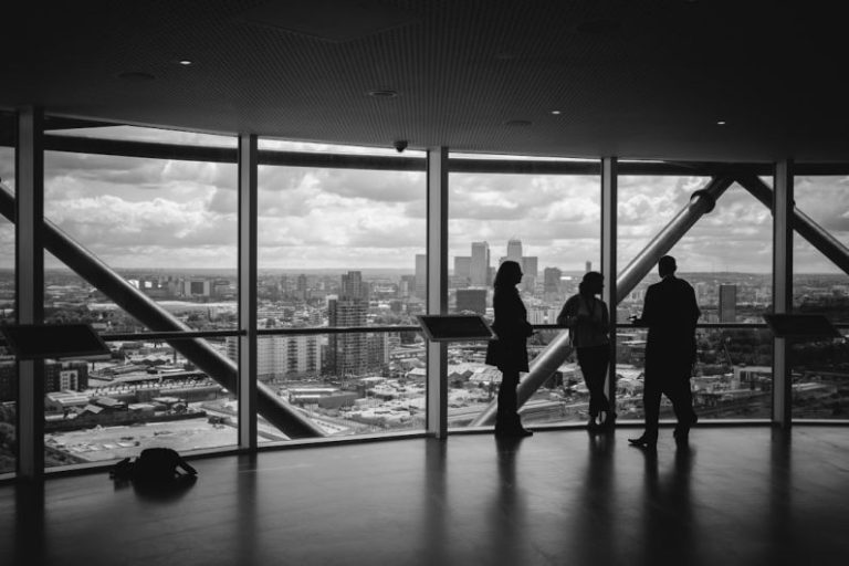 Leadership Business - people standing inside city building