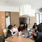 Leadership Business - photography of people inside room during daytime