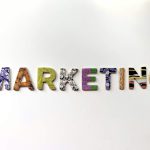 Marketing - multicolored marketing freestanding letter