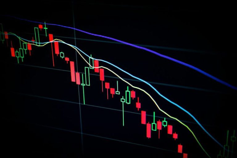 Investing - red and blue light streaks