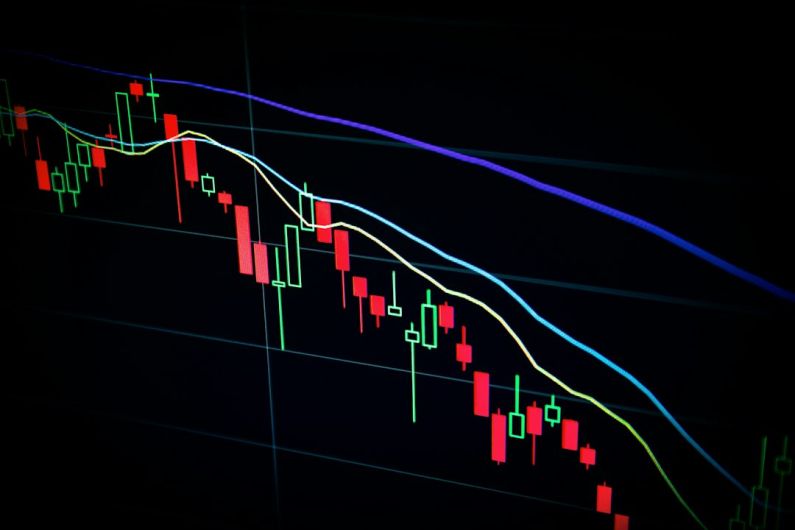 Investing - red and blue light streaks