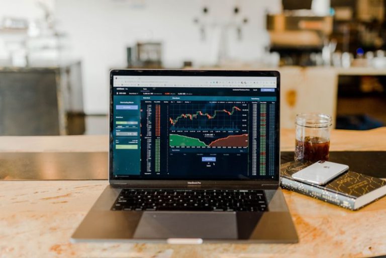 Invest - turned-on MacBook Pro