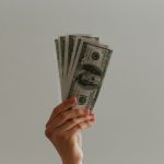 Invest - 100 US dollar banknote