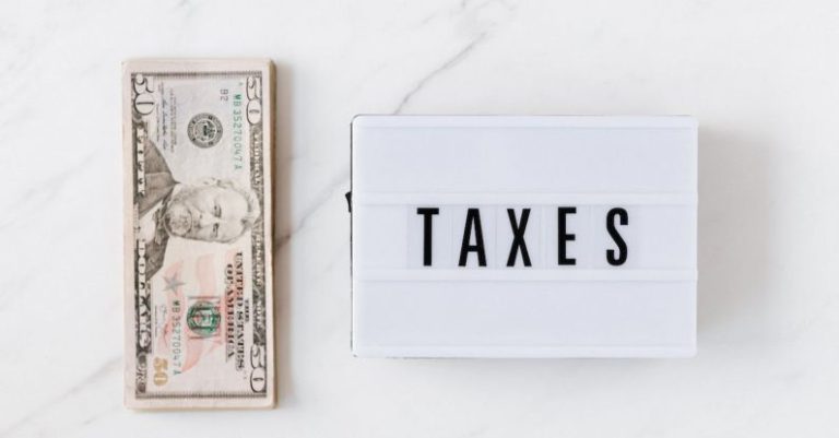 Monetary Policy - American dollar bills and vintage light box with inscription