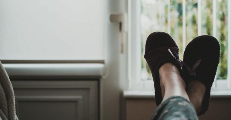 Rest - Person Wearing Pair of Black Slides