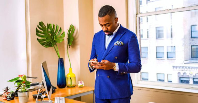 Responsibility - Man Standing While Using Phone