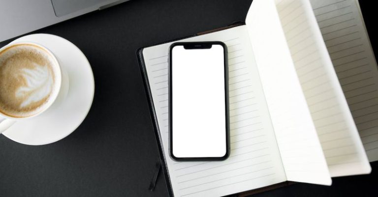 5G - Mobile Phone on Top of Stationery