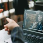 Nonverbal - Young lady learning sign language during online lesson with female tutor