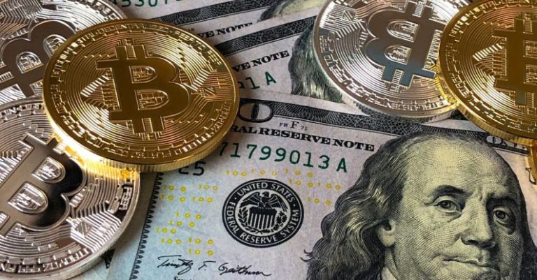 Currency - Bitcoins and U.s Dollar Bills