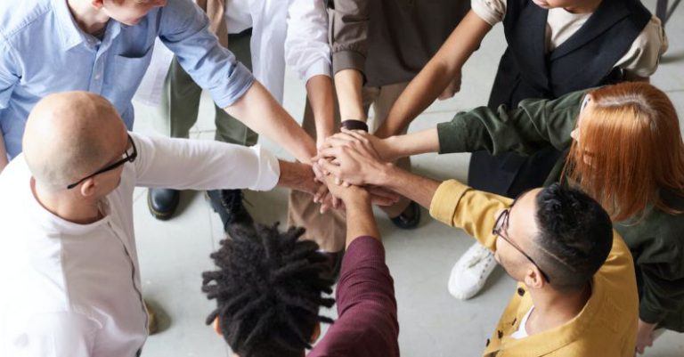 Co-Founders - Photo Of People Holding Each Other's Hands