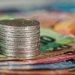 Funding - Assorted Banknotes and Round Silver-colored Coins