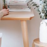 Workspace Design - Anonymous woman working on laptop in room