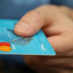 Credit - Person Holding Debit Card