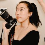 Creative Problem Solving - Asian woman with photo camera in hand