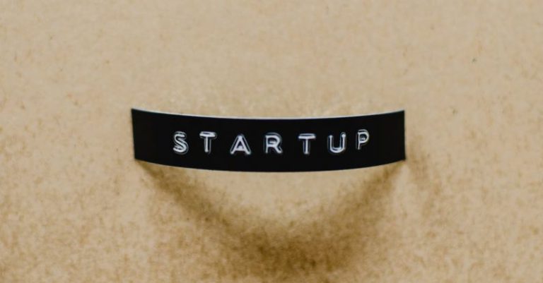 Start-up - Start-up Word on a Beige Background