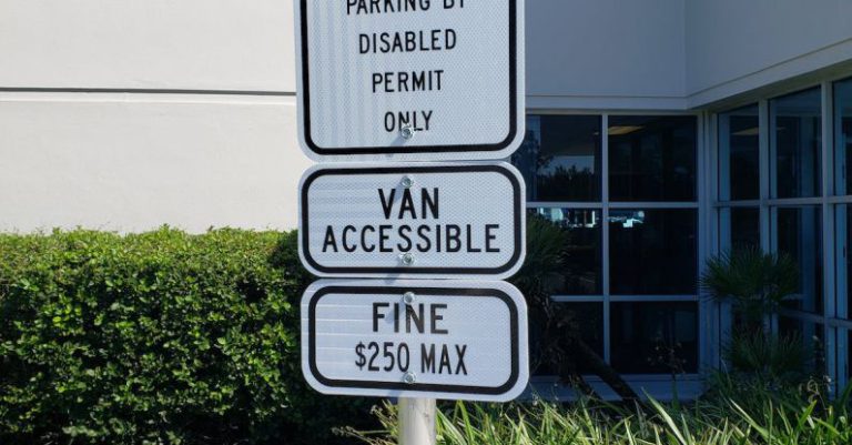 Cryptocurrency Regulation - White and Blue Street Sign